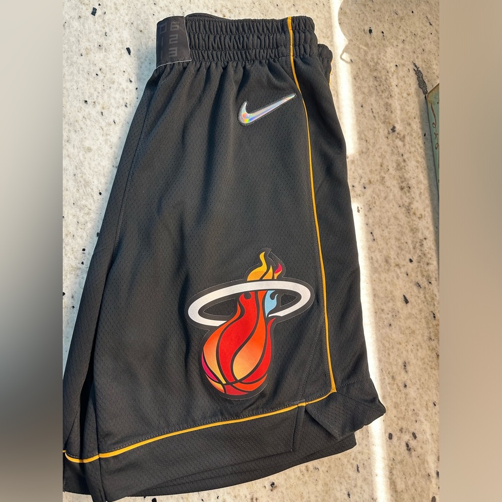 Nike Black Athletic Shorts with Red and Yellow Accents